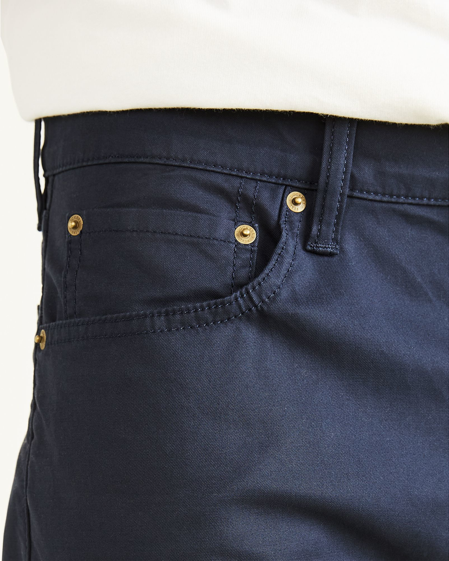 View of model wearing Navy Blazer Men's Slim Fit Smart 360 Flex Jean Cut Pants.