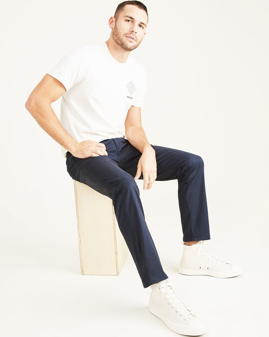 View of model wearing Navy Blazer Men's Slim Fit Smart 360 Flex Jean Cut Pants.