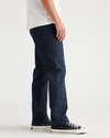 Side view of model wearing Navy Blazer Original Chino, Slim Fit.