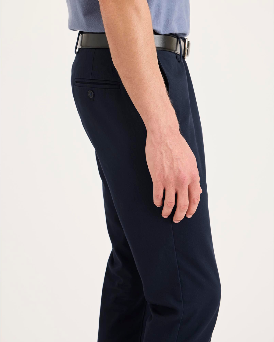 Side view of model wearing Navy Blazer Signature Iron Free Khakis, Skinny Fit with Stain Defender®.
