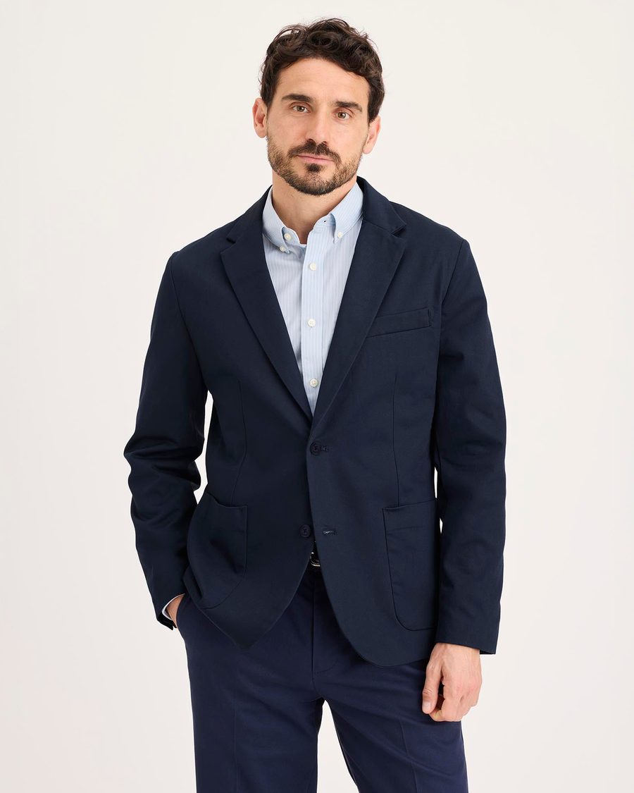 Front view of model wearing Navy Blazer Signature Refined Blazer, Regular Fit.