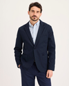 Front view of model wearing Navy Blazer Signature Refined Blazer, Regular Fit.