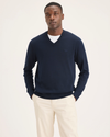 Front view of model wearing Navy Blazer V Neck Sweater.