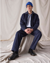 View of model wearing Navy Blue Dockers® x Transnomadica Mechanics Jacket.
