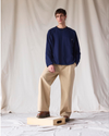 View of model wearing New British Khaki Dockers® x Transnomadica Rigger Pant.