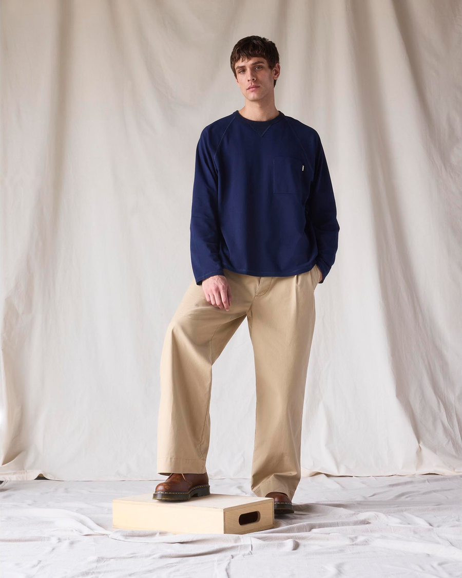 View of model wearing New British Khaki Dockers® x Transnomadica Rigger Pant.