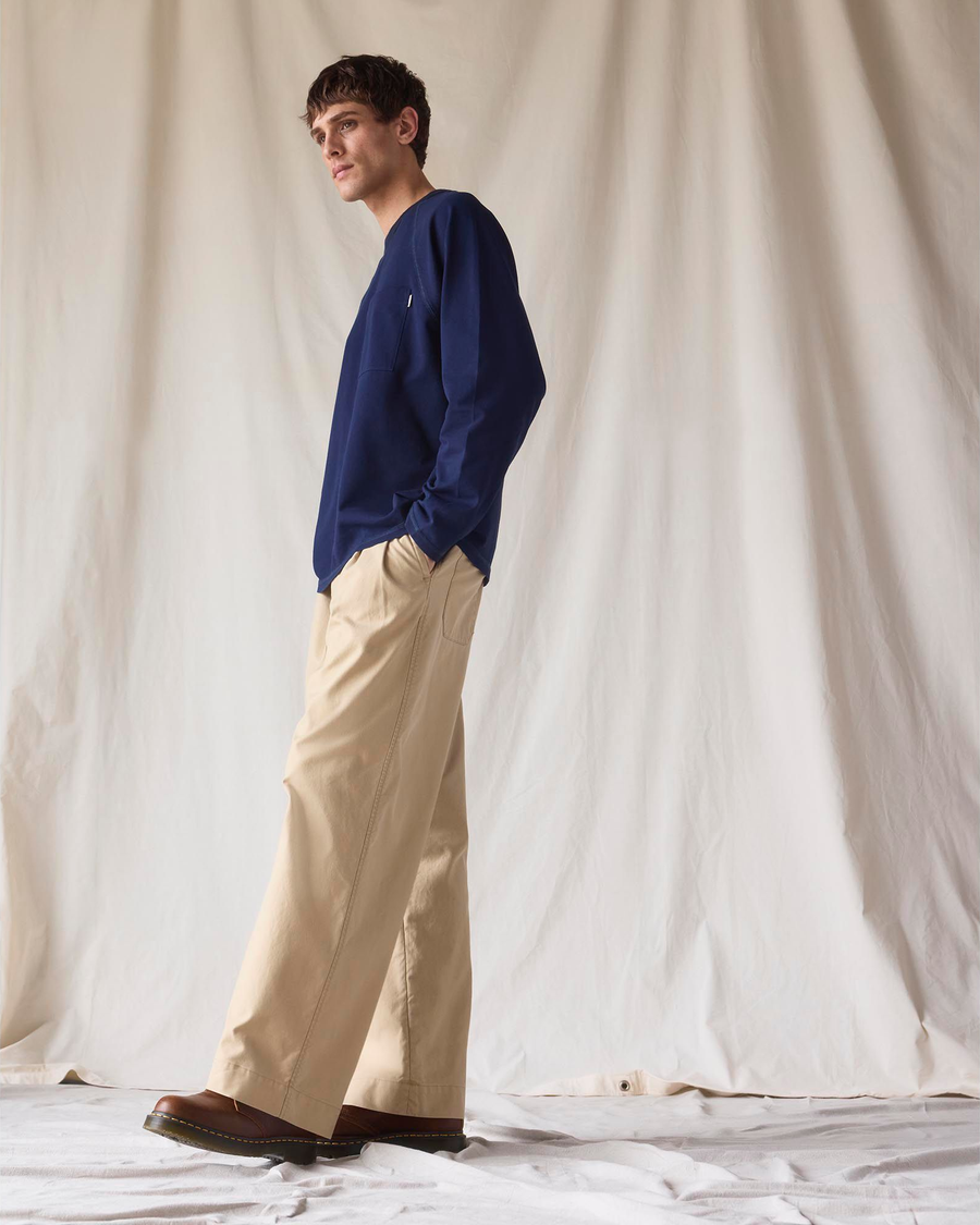 Front view of model wearing New British Khaki Dockers® x Transnomadica Rigger Pant.