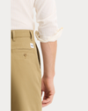 View of model wearing New British Khaki Eighty-Six Original Chino Pants, Loose Fit.