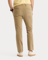 Back view of model wearing New British Khaki Original Chino Pants, Slim Fit.