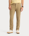 Front view of model wearing New British Khaki Original Chino Pants, Slim Fit.