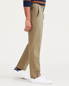 Side view of model wearing New British Khaki Signature Iron Free Khakis, Creased, Slim Fit with Stain Defender®.