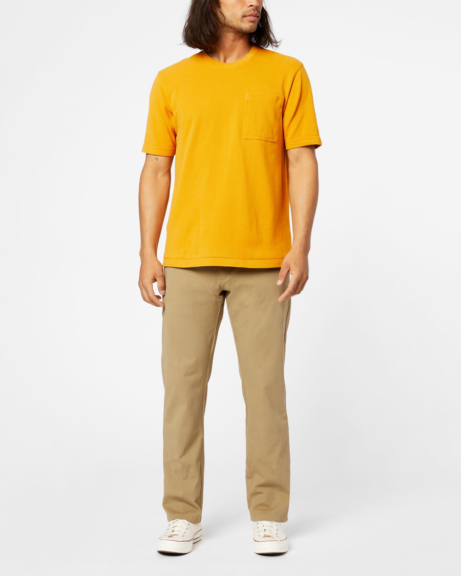 Front view of model wearing New British Khaki Ultimate Chinos, Straight Fit.