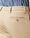 View of model wearing New British Khaki Workday Khaki Pants, Slim Fit.