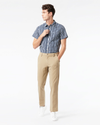 Front view of model wearing New British Khaki Workday Khaki Pants, Slim Fit.