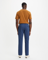 Back view of model wearing Ocean Blue Crafted Khaki Pants, Slim Fit.