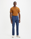 Front view of model wearing Ocean Blue Crafted Khaki Pants, Slim Fit.