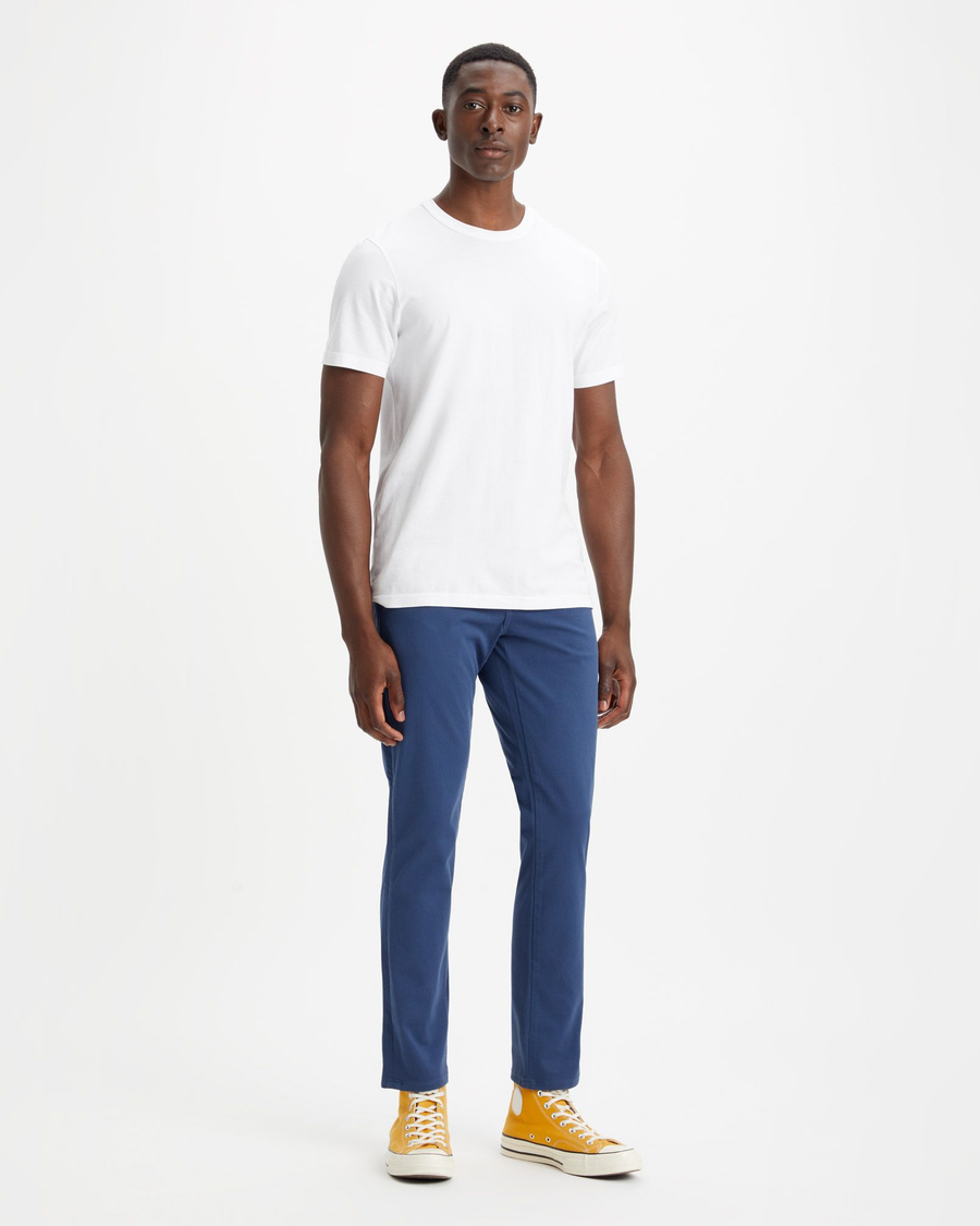 View of model wearing Ocean Blue Men's Skinny Fit Supreme Flex Alpha Khaki Pants.