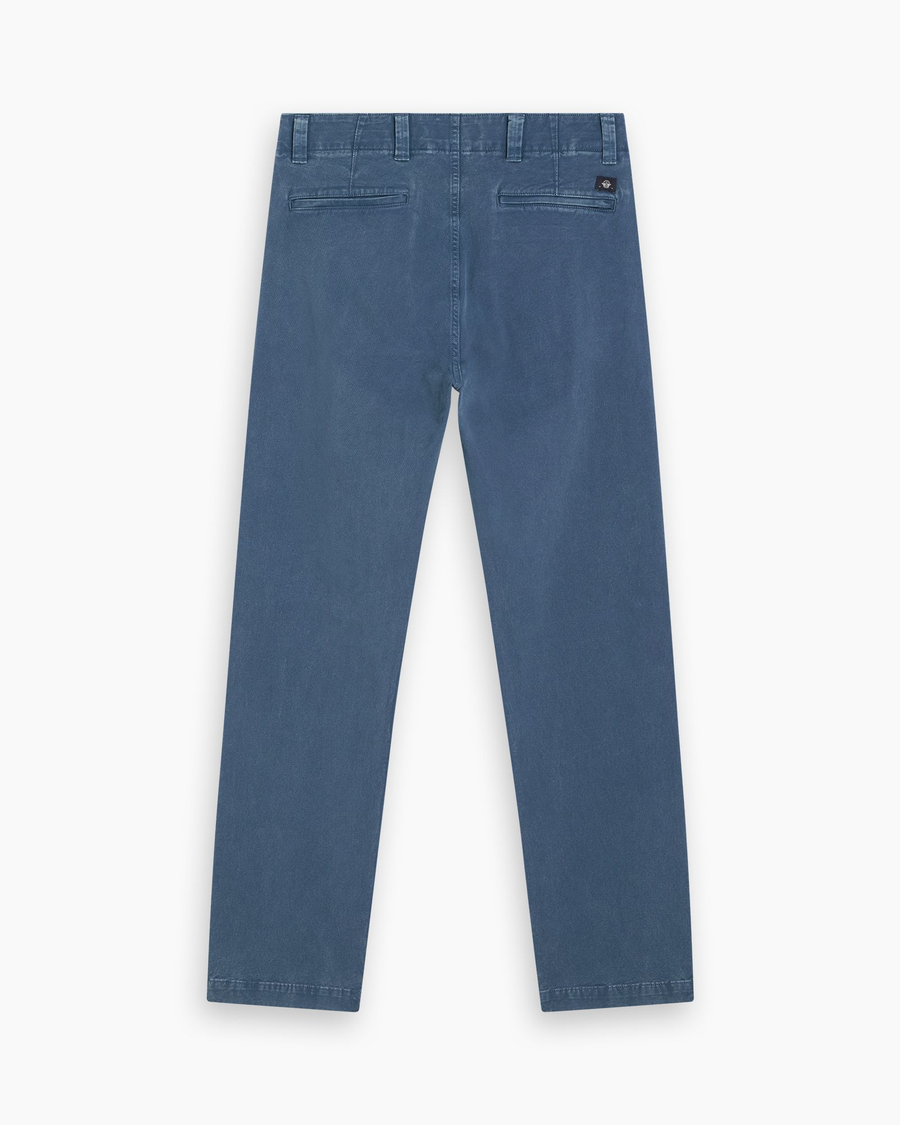 View of model wearing Ocean Blue Stonewash Alpha Chino Pants, Slim Fit.