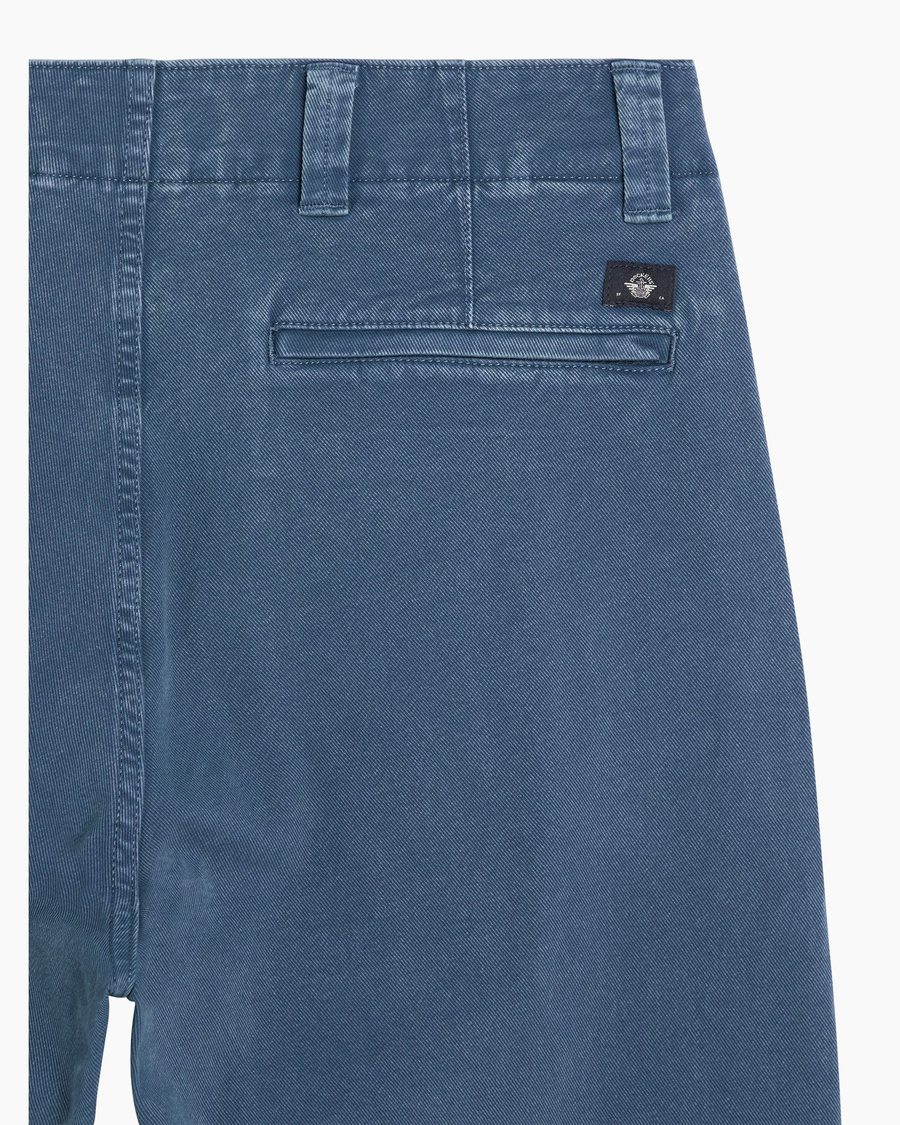 View of model wearing Ocean Blue Stonewash Alpha Chino Pants, Slim Fit.