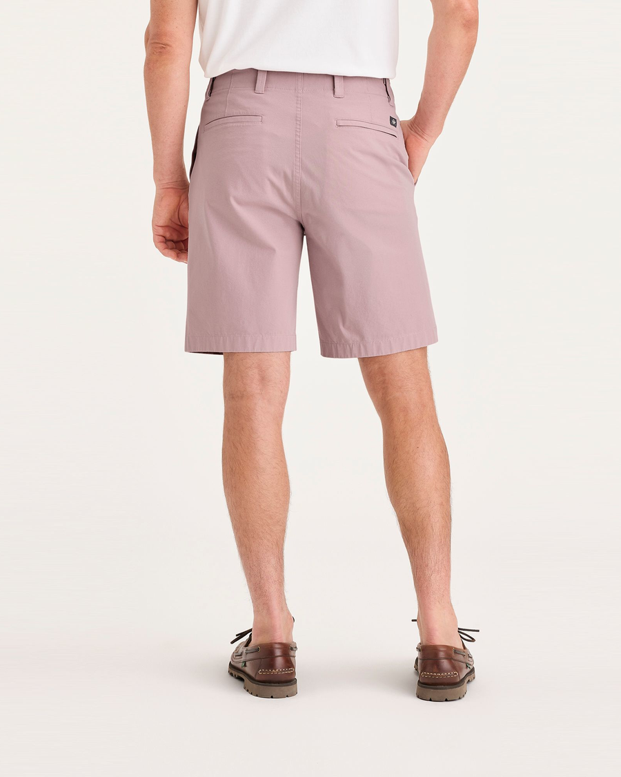 Back view of model wearing Pale Mauve Alpha 8" Shorts.