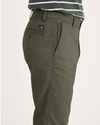Side view of model wearing Parkfied Buttercream Crown Blue Men's Slim Fit Smart 360 Flex Ultimate Chino Pants.