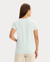 Back view of model wearing Pastel Blue Favorite Tee, Slim Fit.