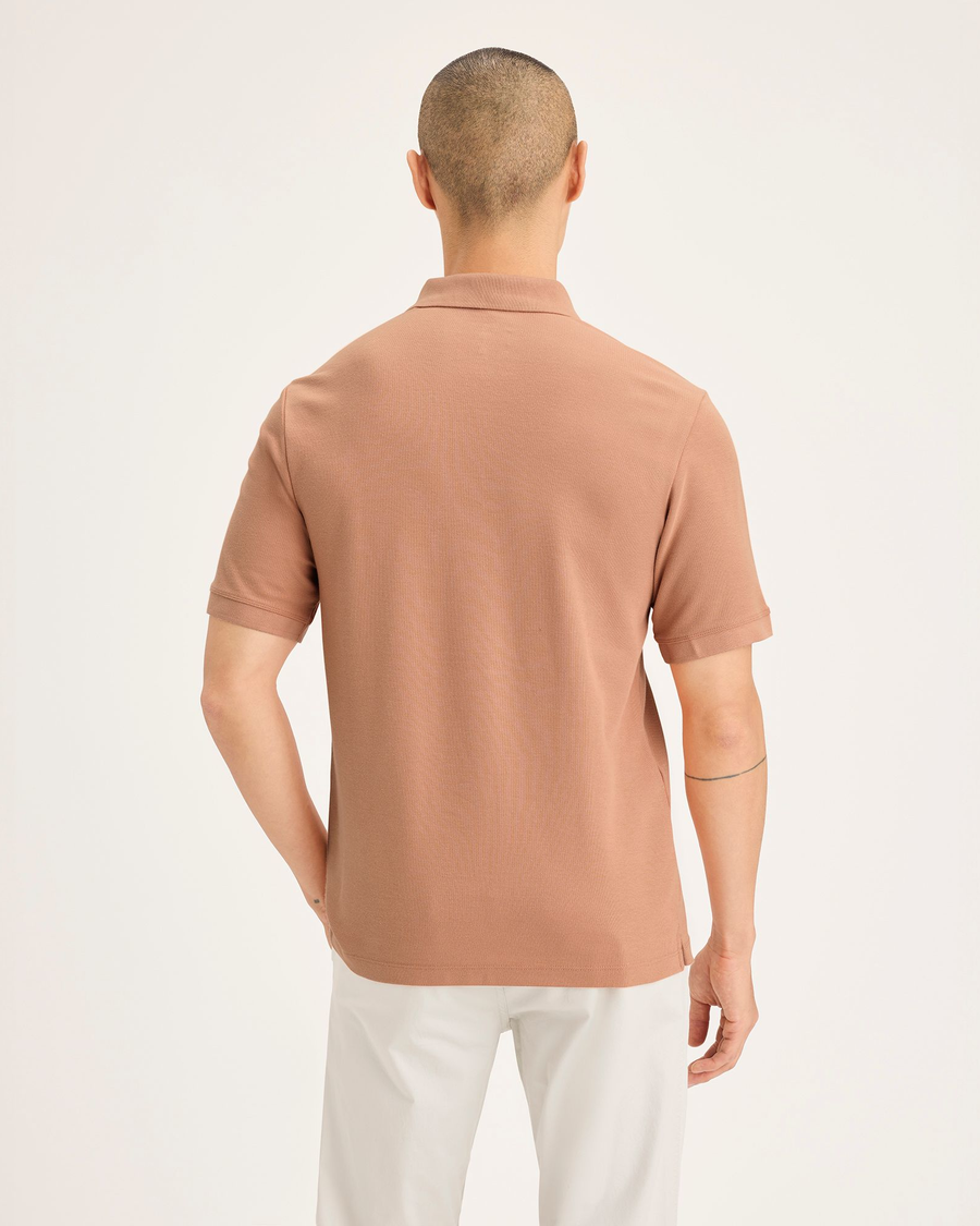 Back view of model wearing Peach Bloom Men's Slim Fit Original Polo Shirt.
