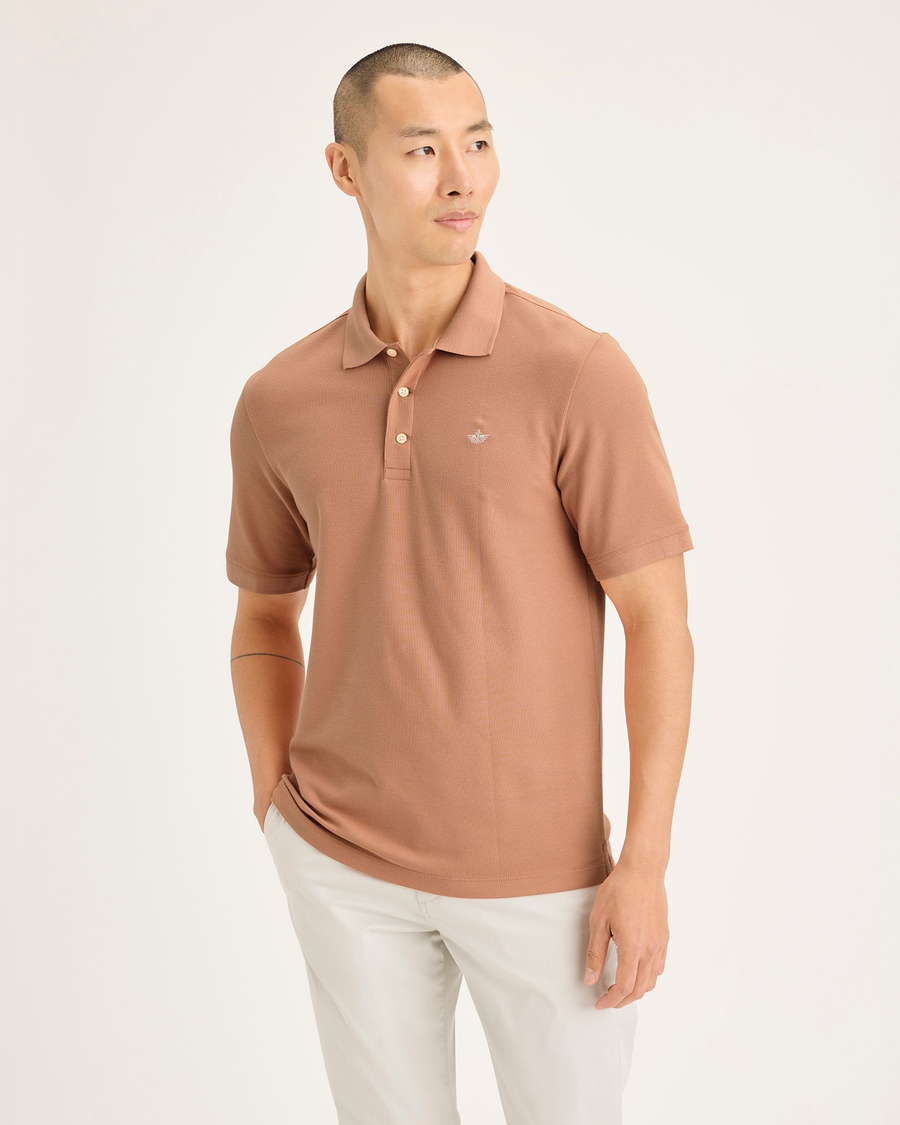 Front view of model wearing Peach Bloom Men's Slim Fit Original Polo Shirt.