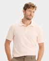 View of model wearing Peach Blush Pique Polo, Slim Fit.