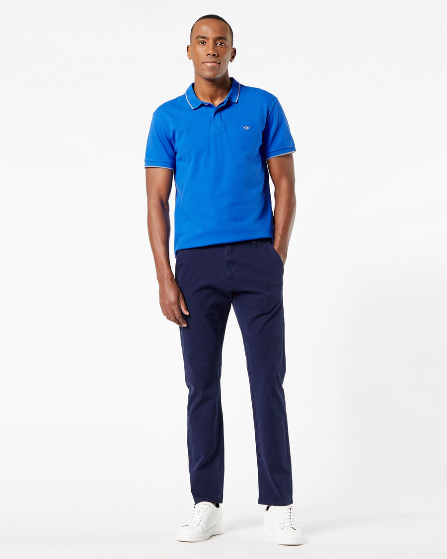 Front view of model wearing Pembroke Men's Slim Fit Smart 360 Flex Ultimate Chino Pants.