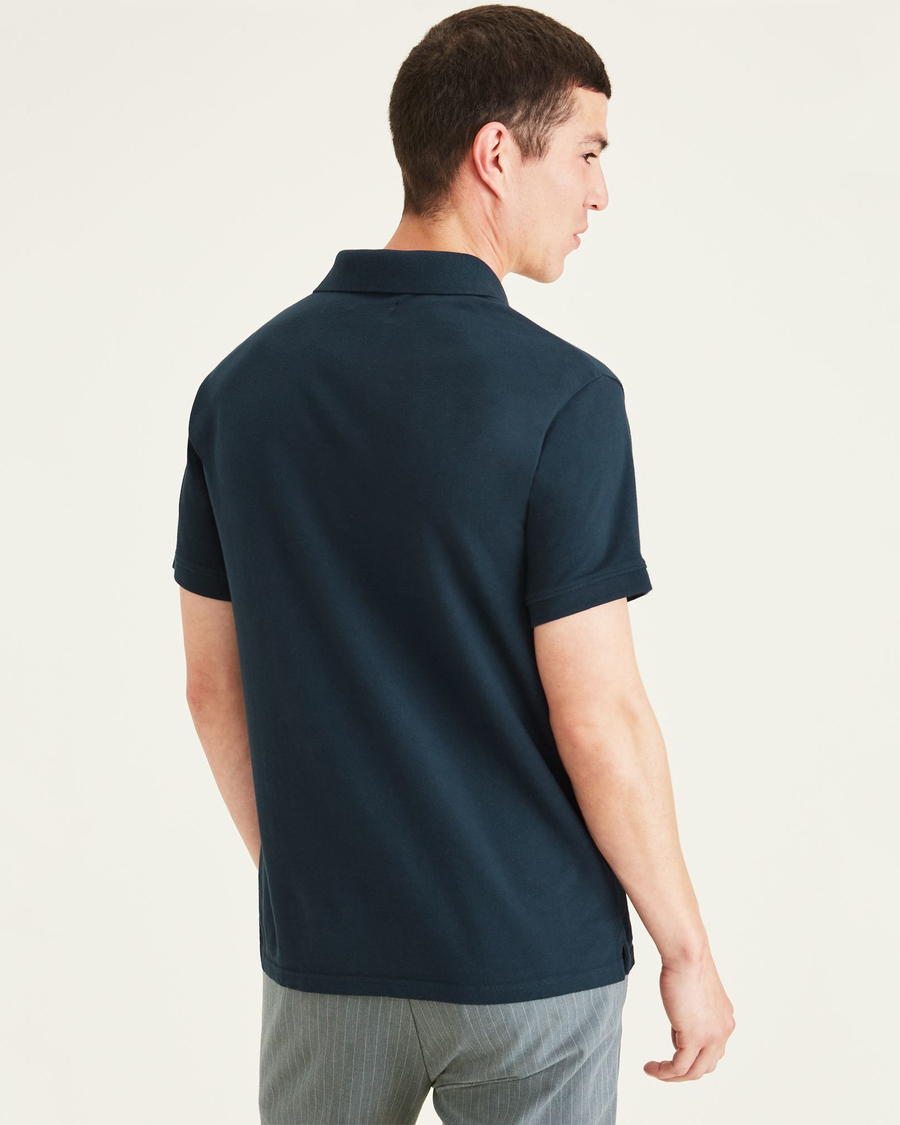 Back view of model wearing Pembroke Pique Polo, Slim Fit.