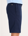 Side view of model wearing Pembroke Ultimate Shorts.