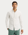 Front view of model wearing Playoff Tea 2 Button Collar Shirt, Slim Fit.