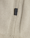 View of model wearing Pure Cashmere Turtleneck Sweater, Regular Fit.