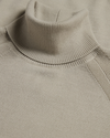 View of model wearing Pure Cashmere Turtleneck Sweater, Regular Fit.