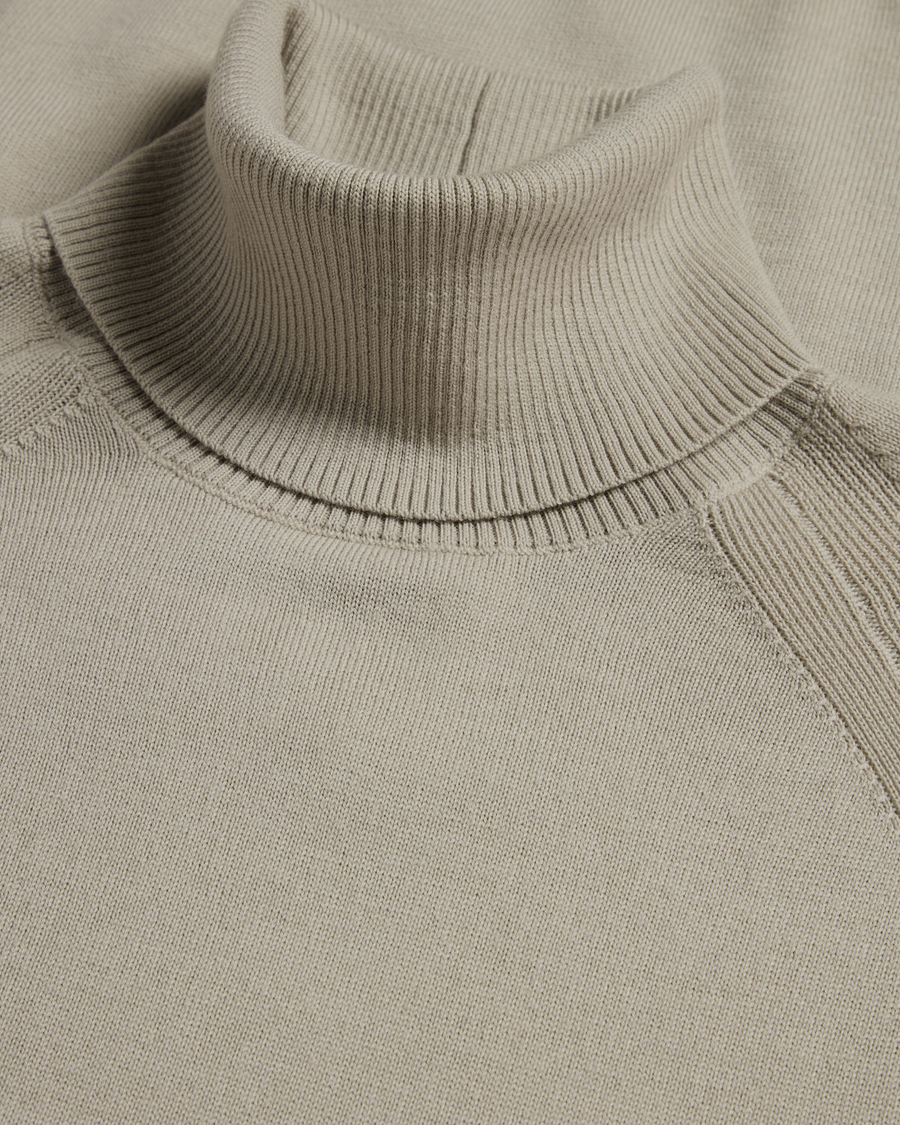 View of model wearing Pure Cashmere Turtleneck Sweater, Regular Fit.