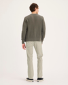 Back view of model wearing Pure Cashmere Ultimate Chinos, Slim Fit.