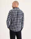 Back view of model wearing Roland Total Eclipse Men's Regular Fit 2 Pocket Work Shirt.