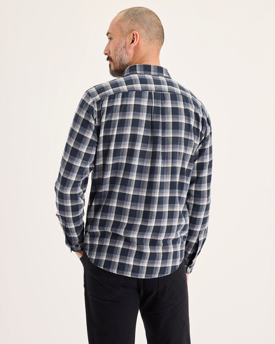Back view of model wearing Roland Total Eclipse Men's Regular Fit 2 Pocket Work Shirt.