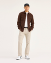 View of model wearing Safari Beige Workday Khaki Pants, Slim Fit.