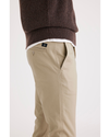 Side view of model wearing Safari Men's Skinny Fit Original Chino Pants.