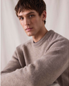 View of model wearing Sahara Khaki Dockers® x Transnomadica Mariner Sweater.