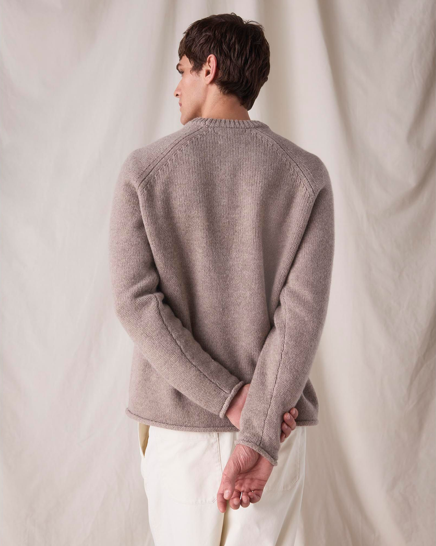 Back view of model wearing Sahara Khaki Dockers® x Transnomadica Mariner Sweater.