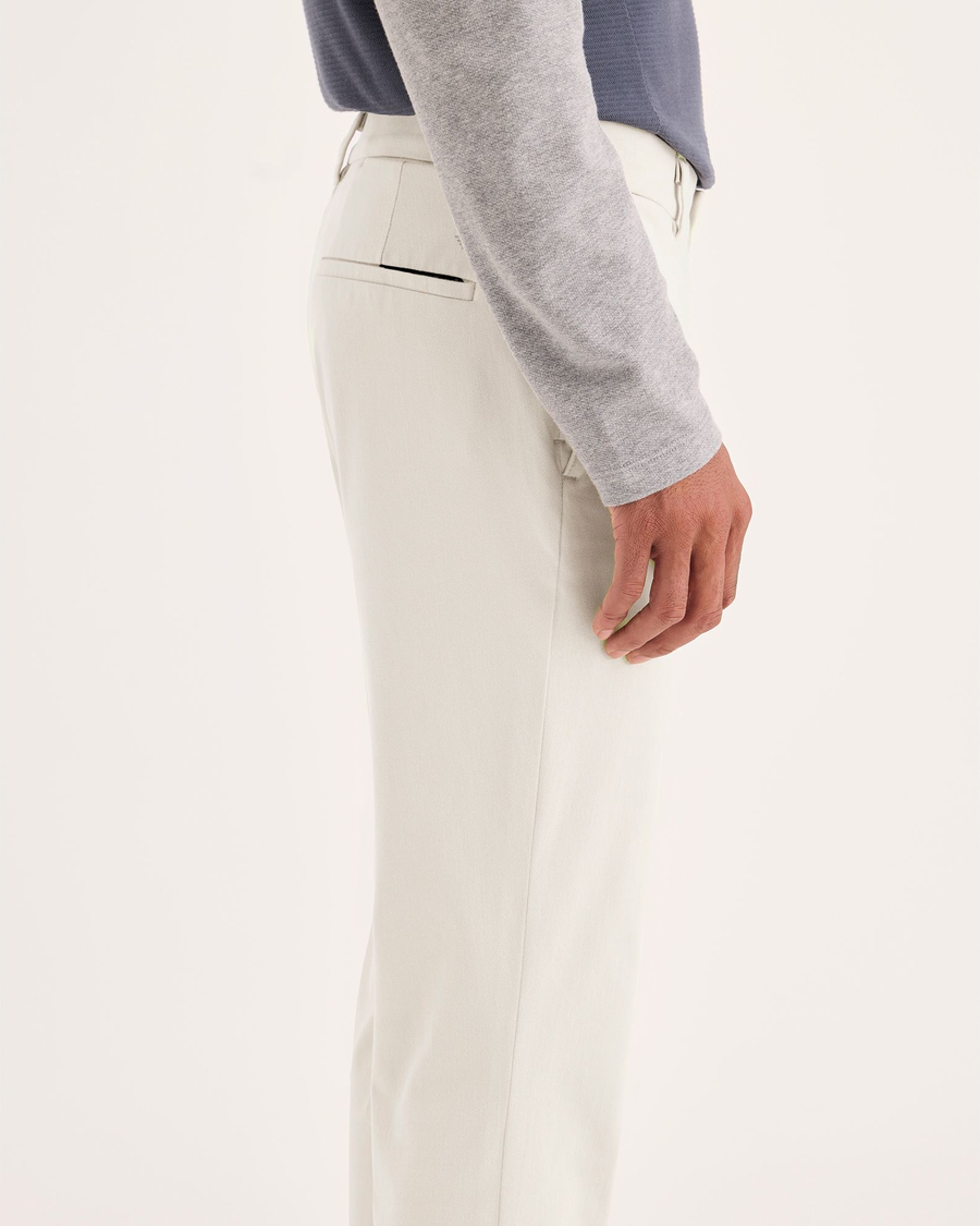 Side view of model wearing Sahara Khaki Go Activeflex Chino, Skinny Fit.