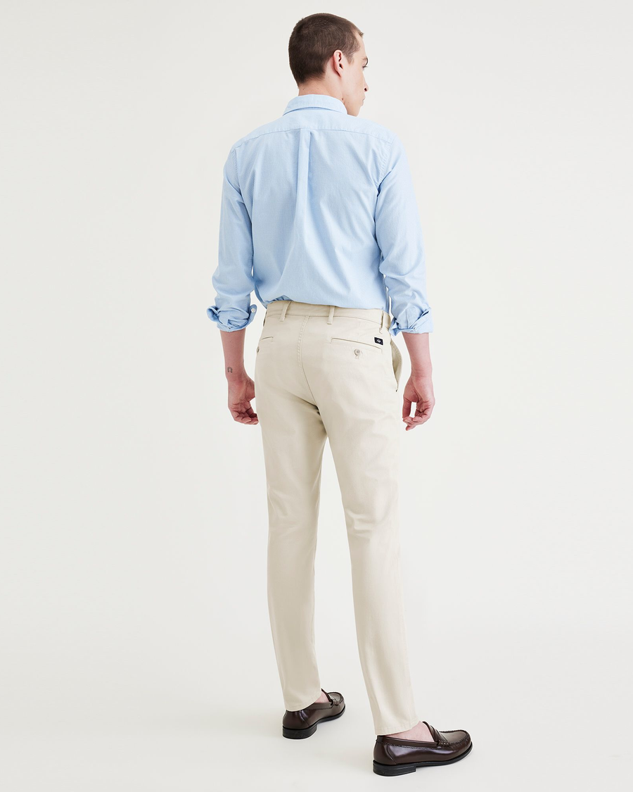 Back view of model wearing Sahara Khaki Men's Skinny Fit Original Chino Pants.