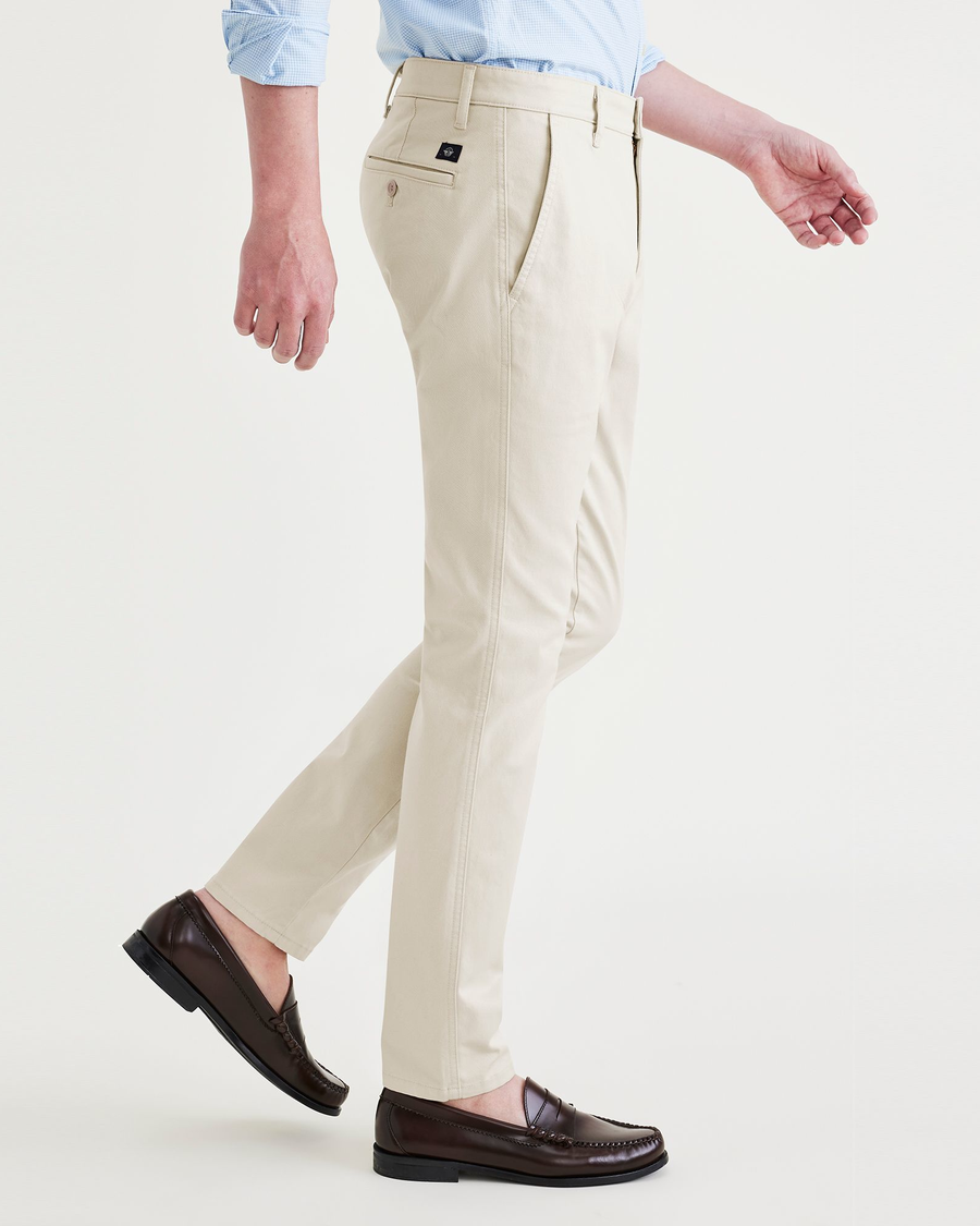 Side view of model wearing Sahara Khaki Men's Skinny Fit Original Chino Pants.