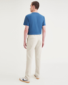 Back view of model wearing Sahara Khaki Men's Skinny Fit Smart 360 Flex California Chino Pants.