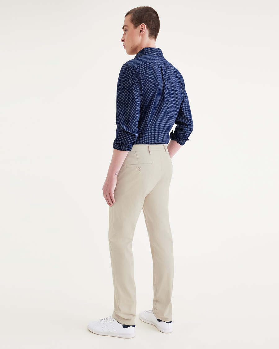 Back view of model wearing Sahara Khaki Men's Slim Fit Supreme Flex Alpha Khaki Pants.