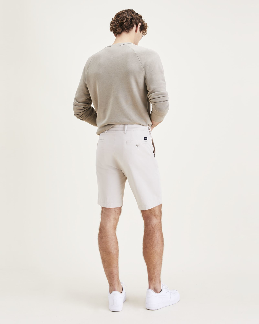 Back view of model wearing Sahara Khaki Men's Supreme Flex Modern Chino Short.