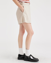 Side view of model wearing Sahara Khaki Women's Mini Skirt.
